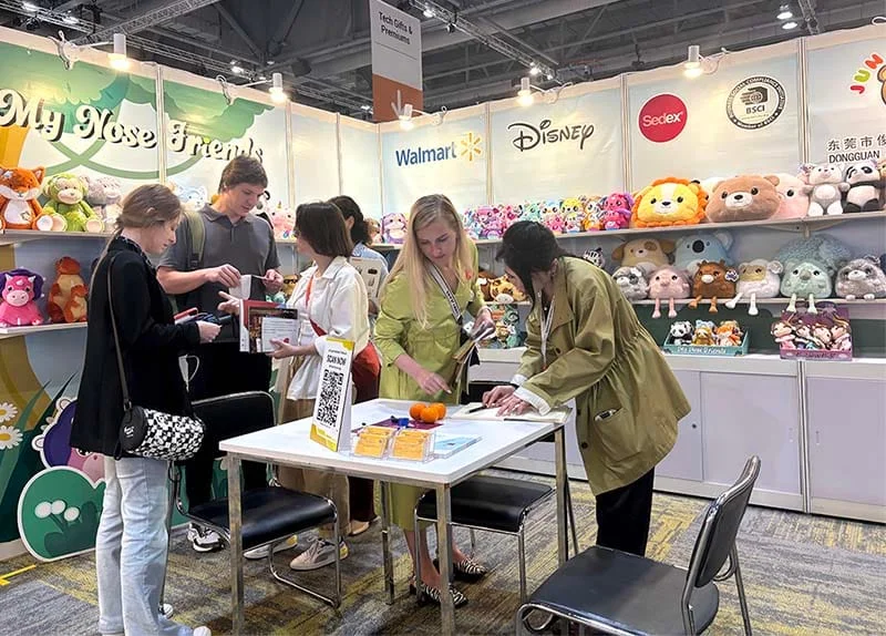 International buyers viewing plush toy products at the Canton Fair